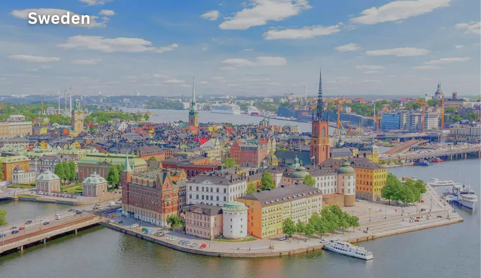 Bright and colorful aerial view of Stockholm’s waterfront and historic buildings, illustrating Sweden as one of the best countries to migrate for free education, healthcare, and future opportunities in innovation and clean energy.